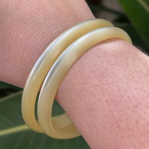 Pair of vintage cream opalescent bangles